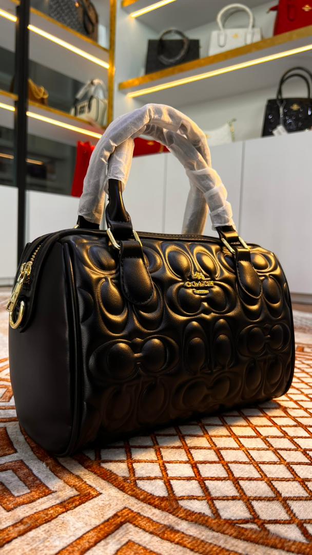 CARTERA BAUL COACH