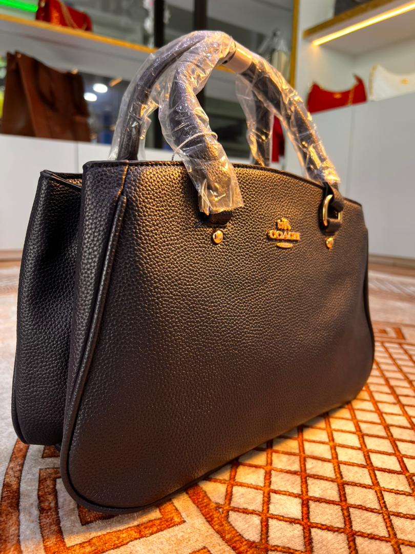 CARTERA CLASICA COACH