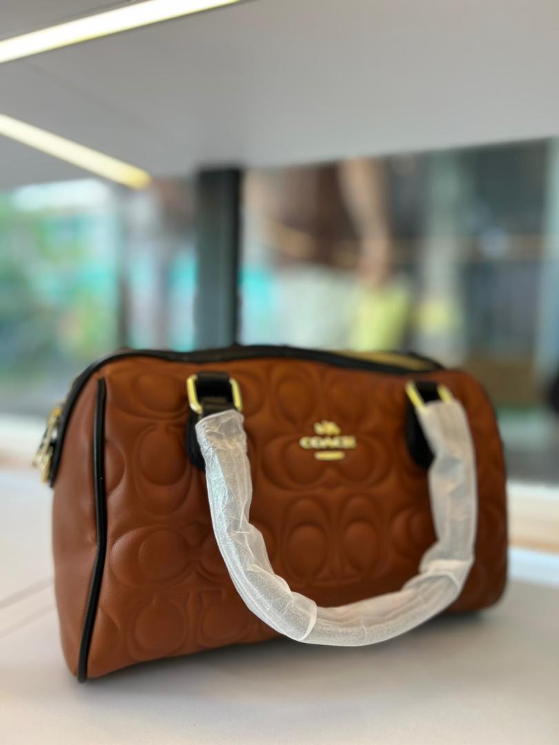 CARTERA BAUL COACH