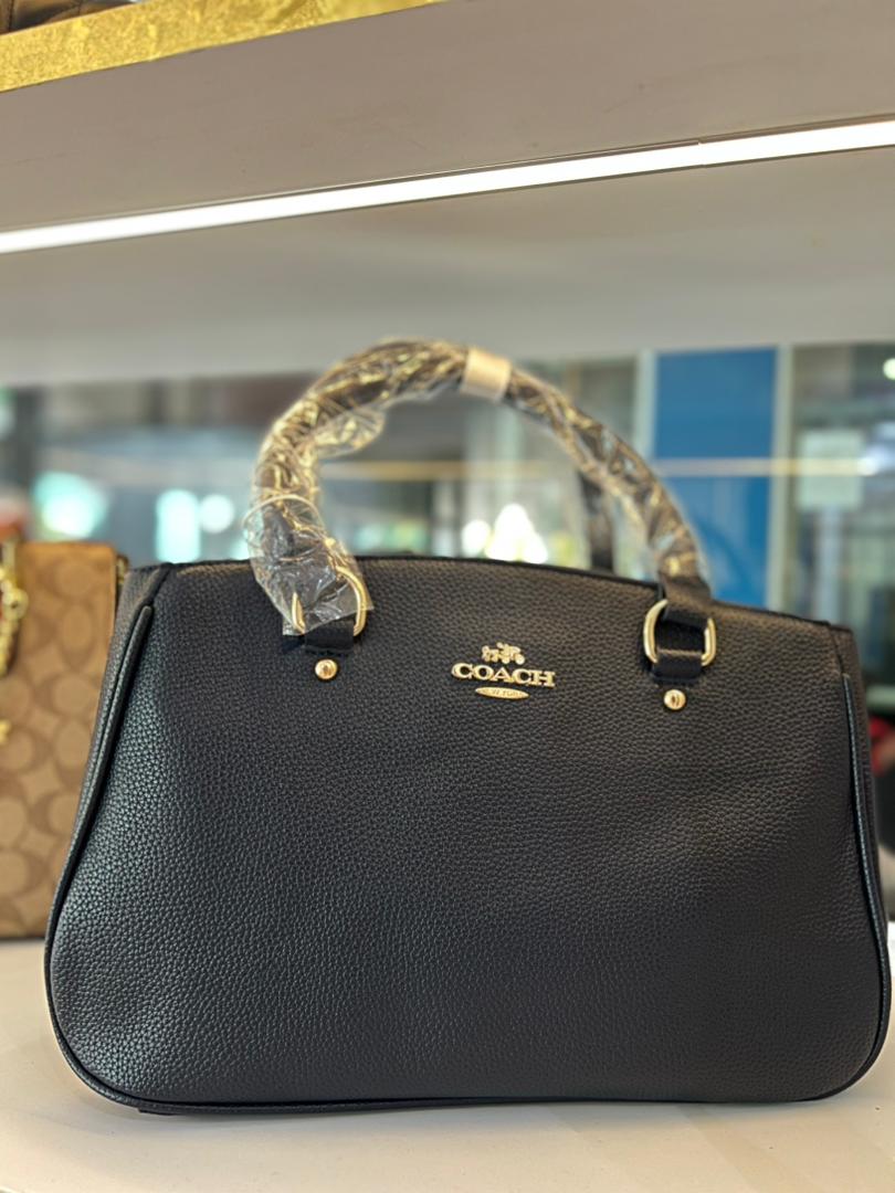 CARTERA CLASICA COACH