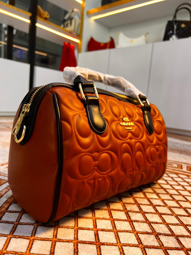 CARTERA BAUL COACH