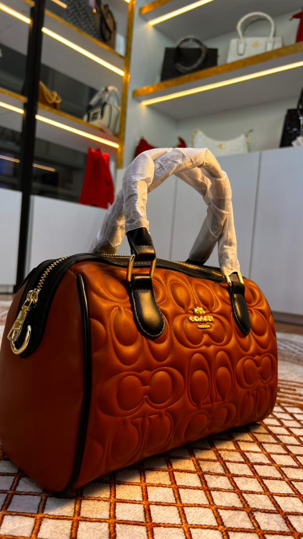 CARTERA BAUL COACH